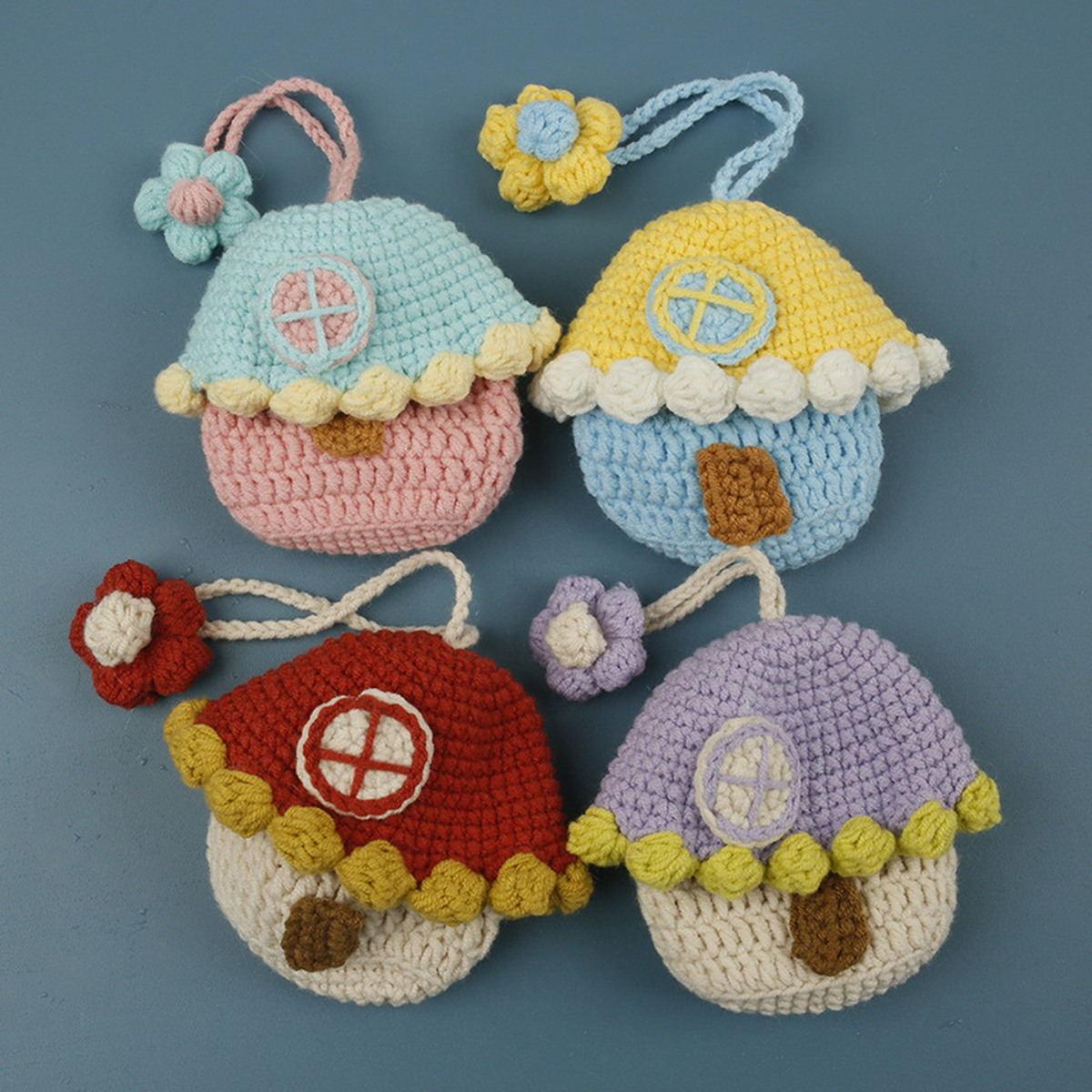Mushroom House Crochet Mini Pouch centered on a clean product background