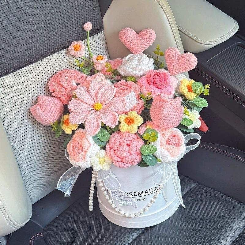 Crochet flower basket arrangements in pink, blue and lavender palettes