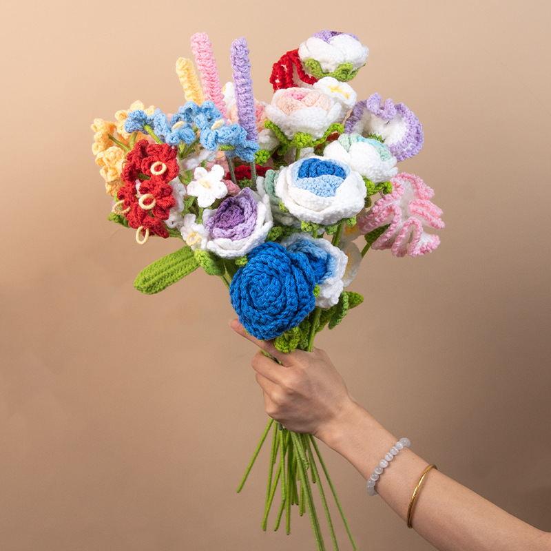 Assorted handmade crochet flower stems in roses, tulips, daisies, sunflowers and garden flower styles