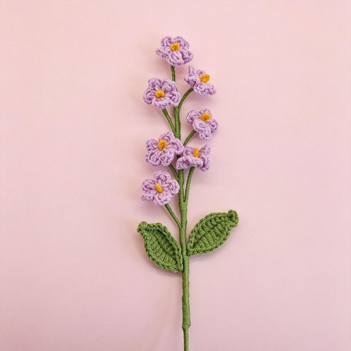 Forget-Me-Not Crochet Stem on a clean pastel product background